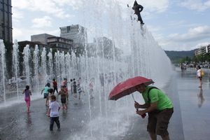 Singing in the fountain.