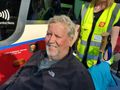 Bob in wheelchair at Craignure, Mull being assisted boarding the ferry to Oban