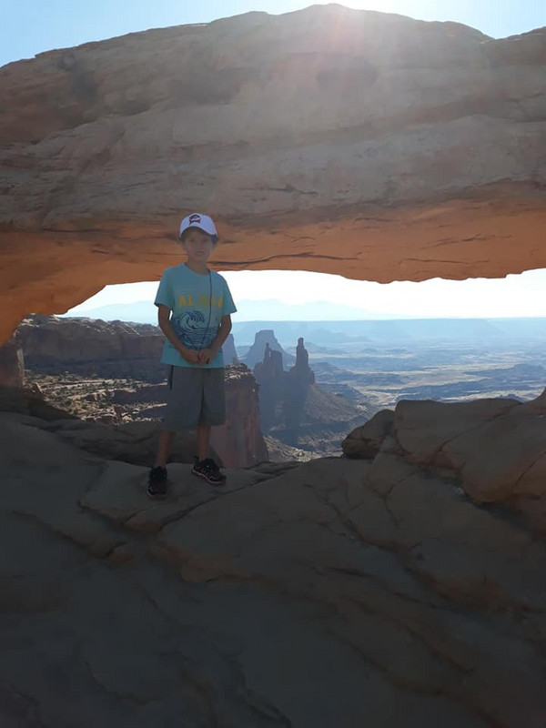 Liam at Mesa Arch in Canyonlands NP