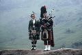 Scots in full regalia in Glen Coe