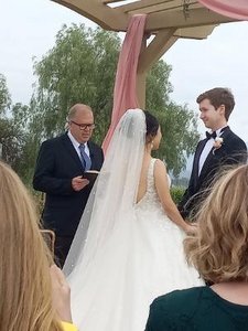 Wedding ceremony with Officiant Steve, Bride Mercy, and Groom Will