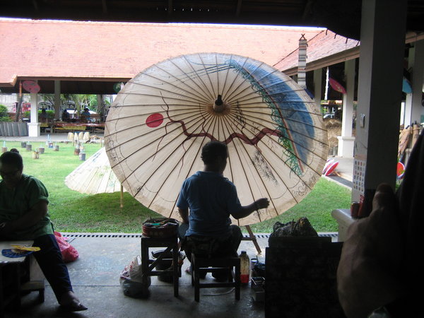 Artisans painting umbrellas at Bo Sang