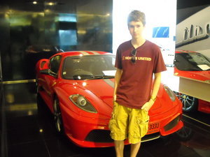 Will next to a Ferrari at the Bangkok Paragon Mall