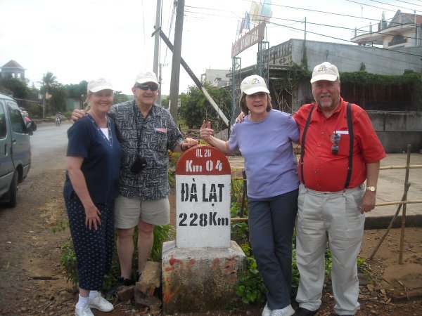 Barb, John, Ruth and Bob at old "mile" marker