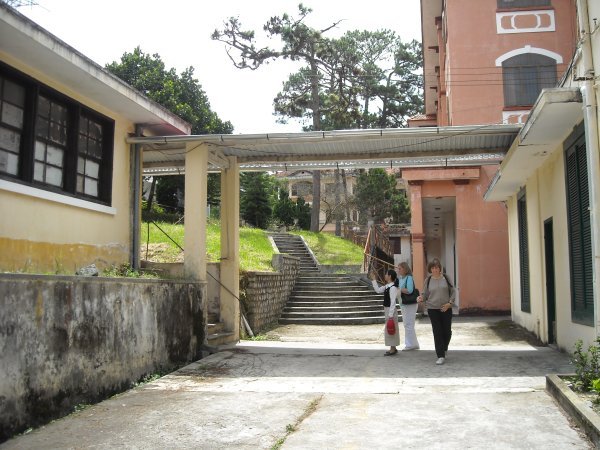 Looking towards the back of the property with the breezeway connecting the boys dorm and dining hall