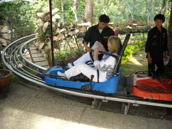 Barb receiving instructions on use of bobsled at Buttermilk Falls