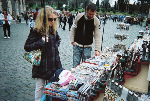 Tamara browsing for souvenirs outside of the Colosseum