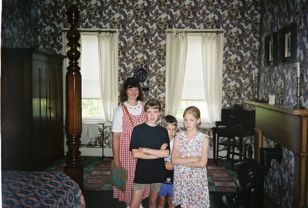 Linda, Tamara, Will, and Rosanna in the Bedroom of Lincoln's Home