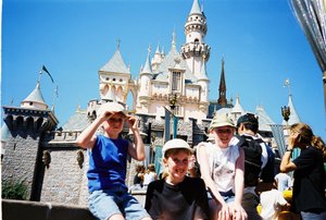 Will, Tamara and Rosanna in front of the Castle in Disneyland