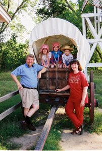 Bob, Tamara, Will, Rosanna and Linda in covered wagon on the Oregon Trail, Nebraska