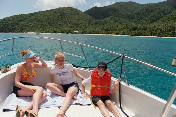 Tamara, Rosanna, and Will sunning on the bow