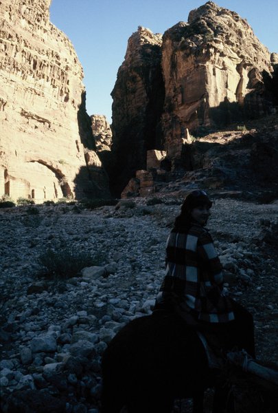 Linda riding her horse into the Siq to Petra