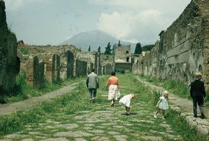 Street of Pompeii with Mt. Vesuvius in distance