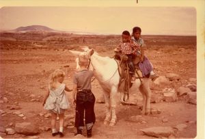 Judy and Bob with Navajo children near Grand Canyon
