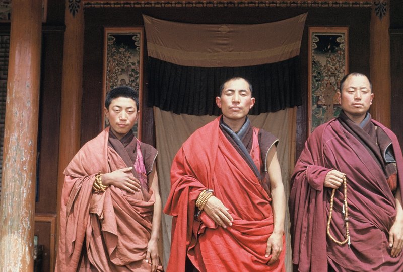 Monks with prayer beads