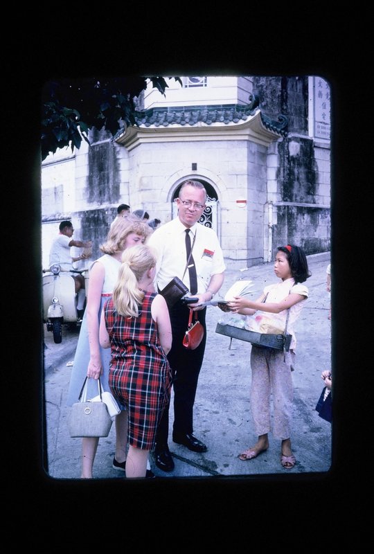Sue, Judy and Dad bargaining in Hong Kong