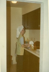 Linda doing dishes on our honeymoon