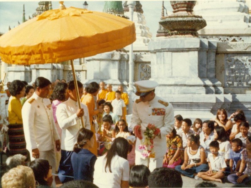 King greeting his people at the Temple