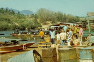 Catching a boat on the River Kwai