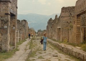 Linda walking the streets of Pompeii