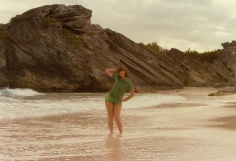 Linda posing on the beach