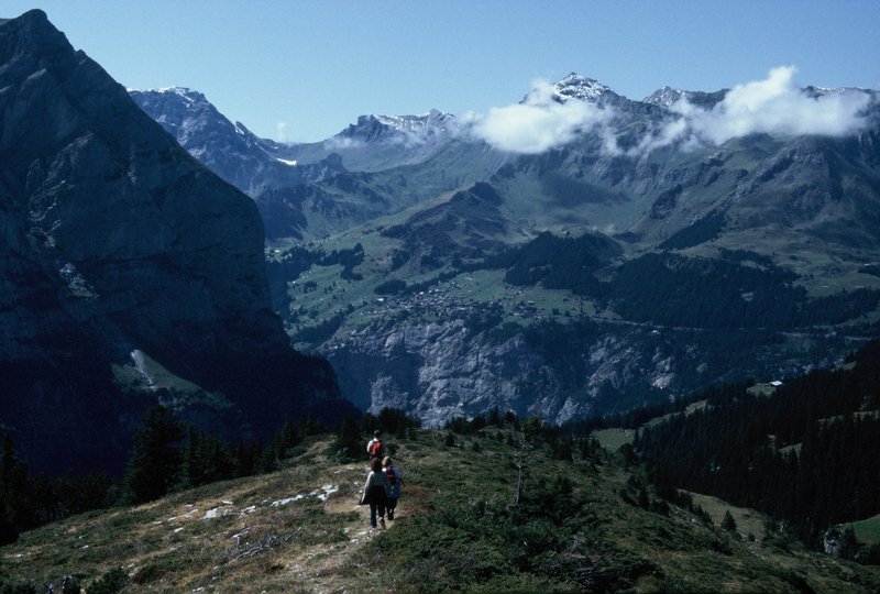 Linda and friends hiking down from Mannlichten to Kleine Scheidegg with Lauterbrunnen Valley in the distance