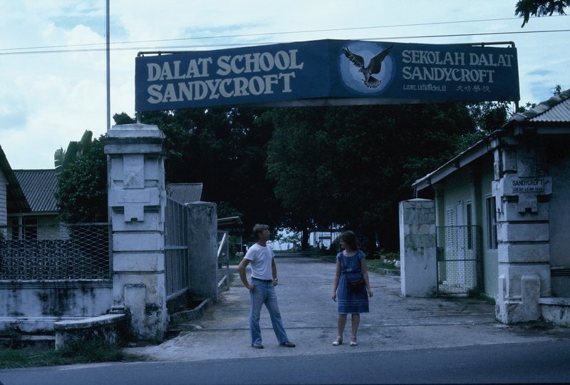 Mr. Tonnesson and Linda at the entrance to Dalat School Penang