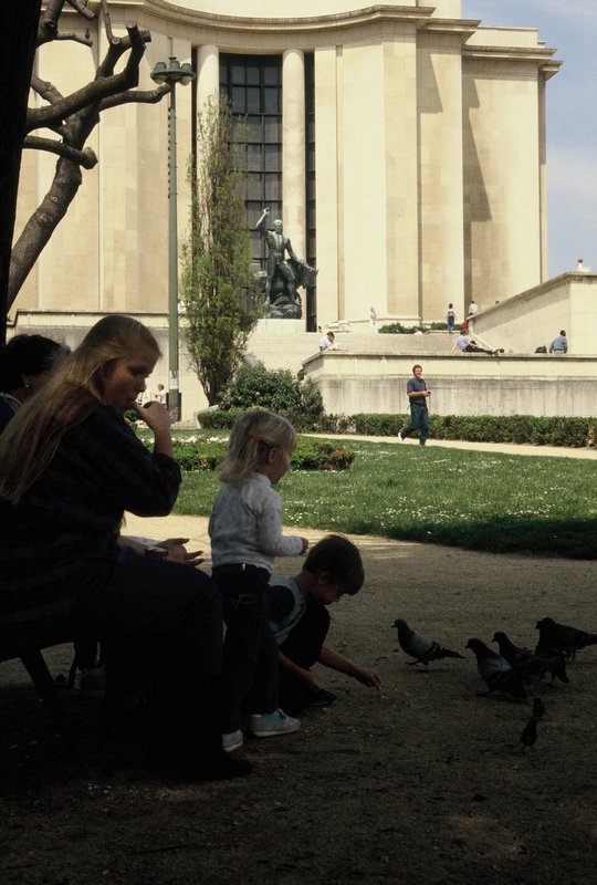 Carol, Alyssa and Brendan feeding pigeons at the Palace of Chaillot, Paris