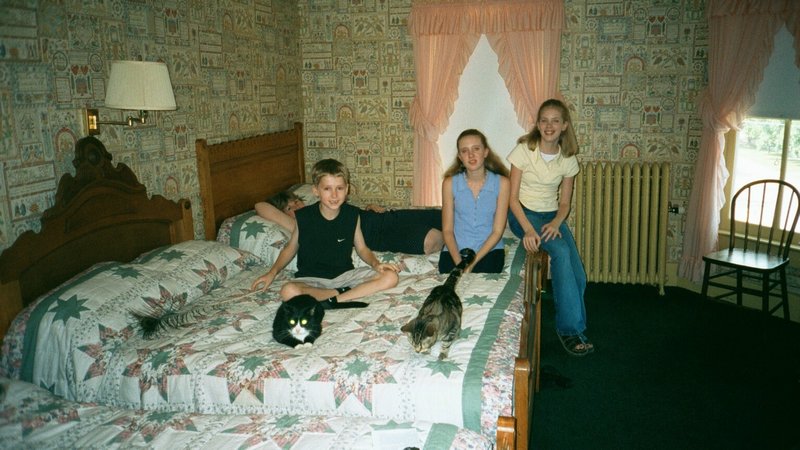 Will, Tamara, and Rosanna at the Anderson House with their cats