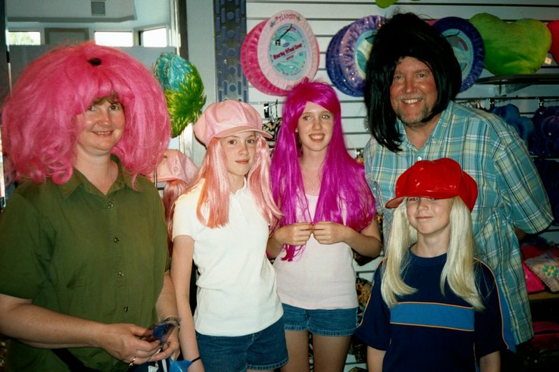 Family in wigs at Disney World