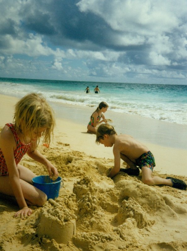 Rosanna and Will building sandcastles at Kailua Beach