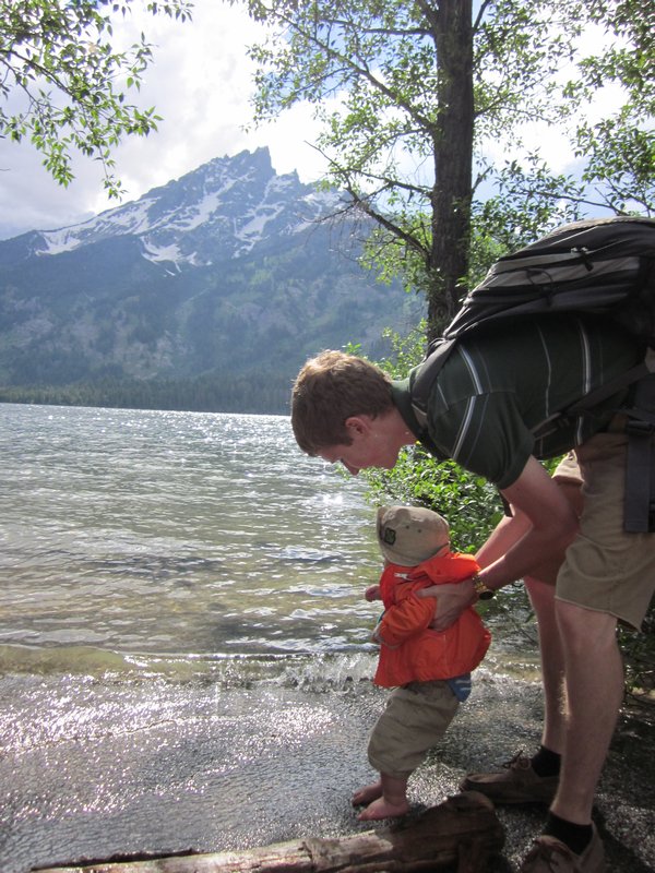 Will and Liam testing the water temperature at Jenny Lake