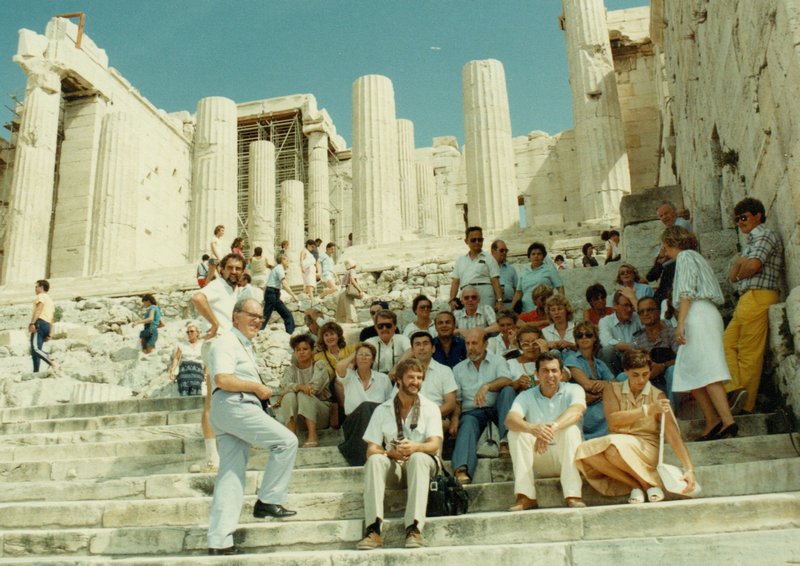 Committee members and spouses on the steps to the Acropolis