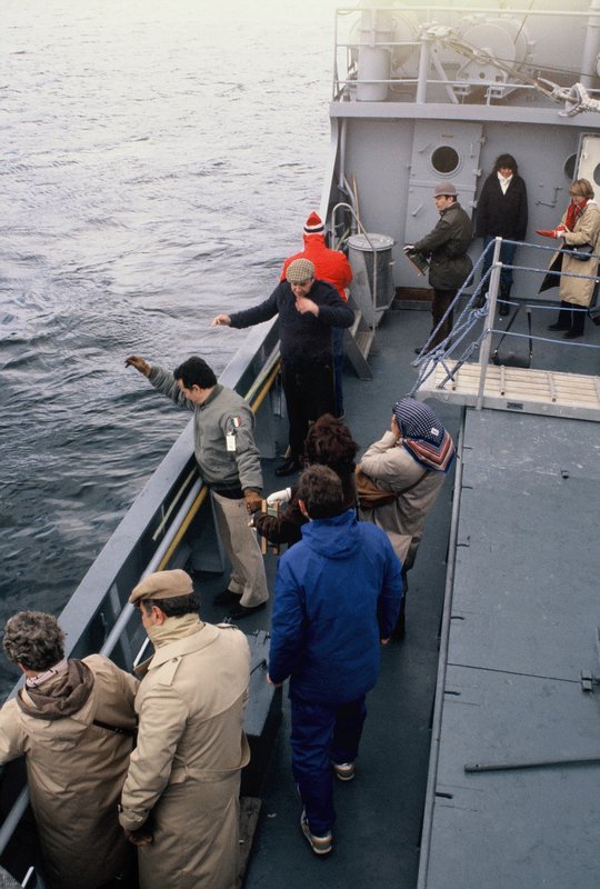 Committee members fishing on a Norwegian minesweeper