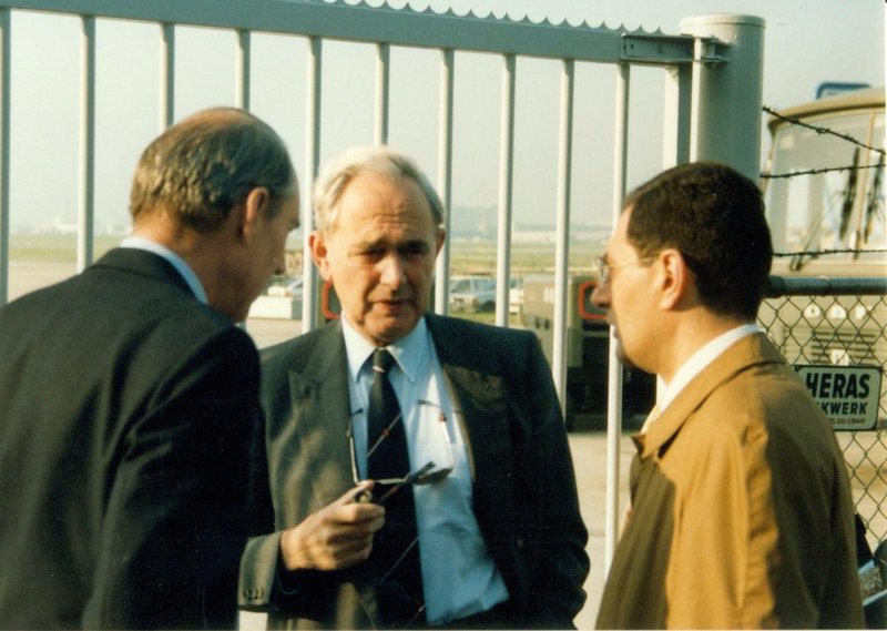 Assistant Secretary General de Laat de Kanter with Chairman Van der Post and Cdr. Polese, the Italian Representative