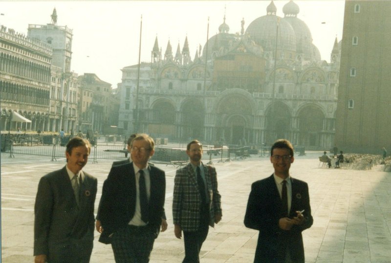 Committee members strolling around St Marks Square