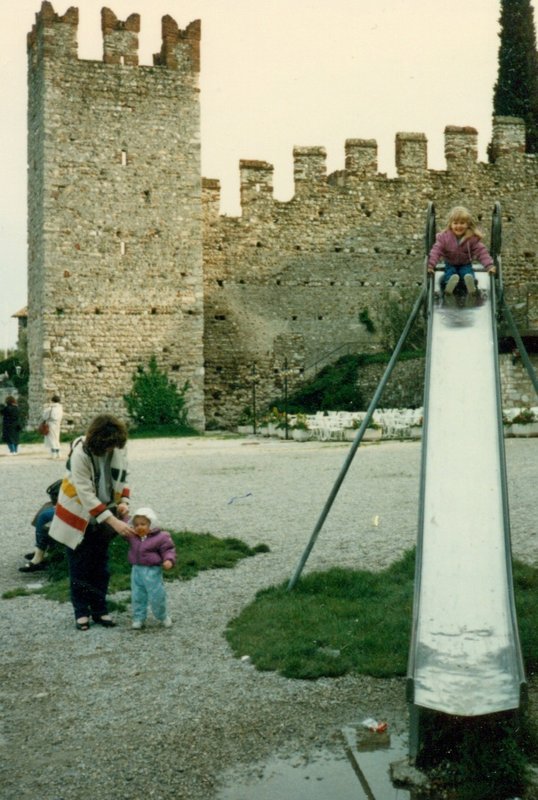 Linda with Rosanna and Tamara on the slide outside the Sirmione city walls