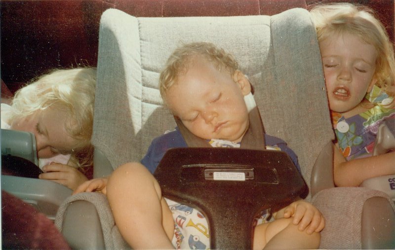 Rosanna, Will,, and Tamara sleeping in the car on the way across the Mojave Desert