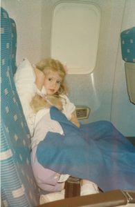 Rosanna sleeping on Tamara during the flight