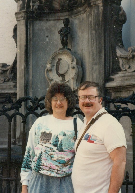 Kathy and Buz with the Mannequin Pis in Brussels