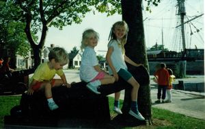 Will, Rosanna, and Tamara on a cannon at Mystic Seaport CT