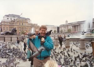 Bob feeding pigeons at Traflagar Square