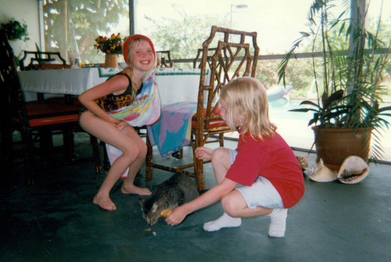 Tamara and Rosanna playing with Sue's cat