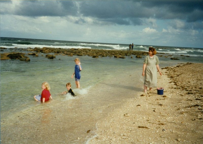 Kids and Linda at the beach