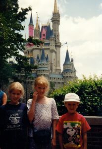 Rosanna, Tamara, and Will in front of the Magic Kingdom Castle