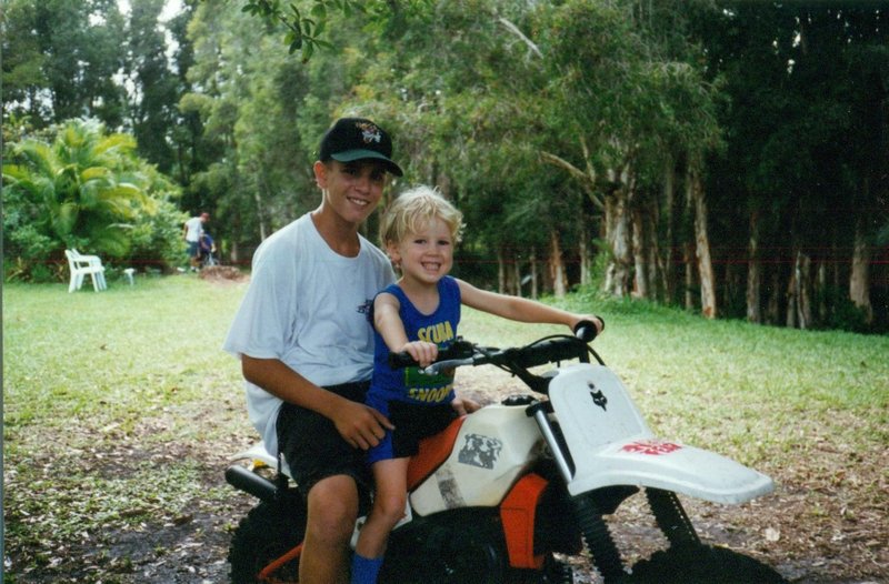 Will with cousin Brendan on his dirt bike