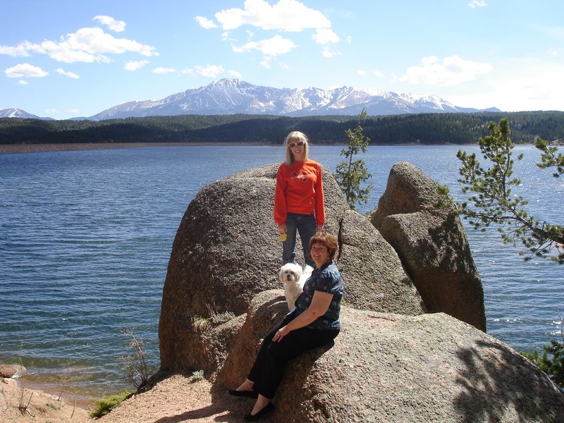 Linda, Bonnie and Rosanna at Rampart Lake with Pikes Peak behind
