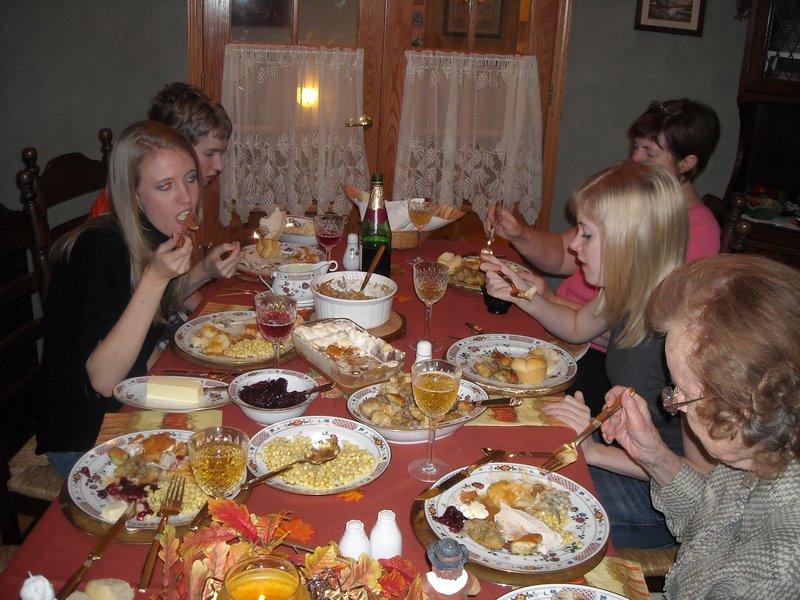 Tamara, Will, Linda, Rosanna, and Mom eating Christmas dinner