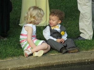Ruthie and Liam in deep conversation at the Wedding Reception