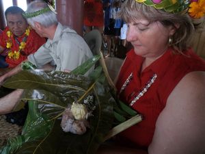 86 Linda checking out lunch of taro, breadfruit, and fish